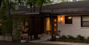 Modern home with a visible Vivint security sign near the entrance, indicating active home alarm system protection and deterring potential intruders.